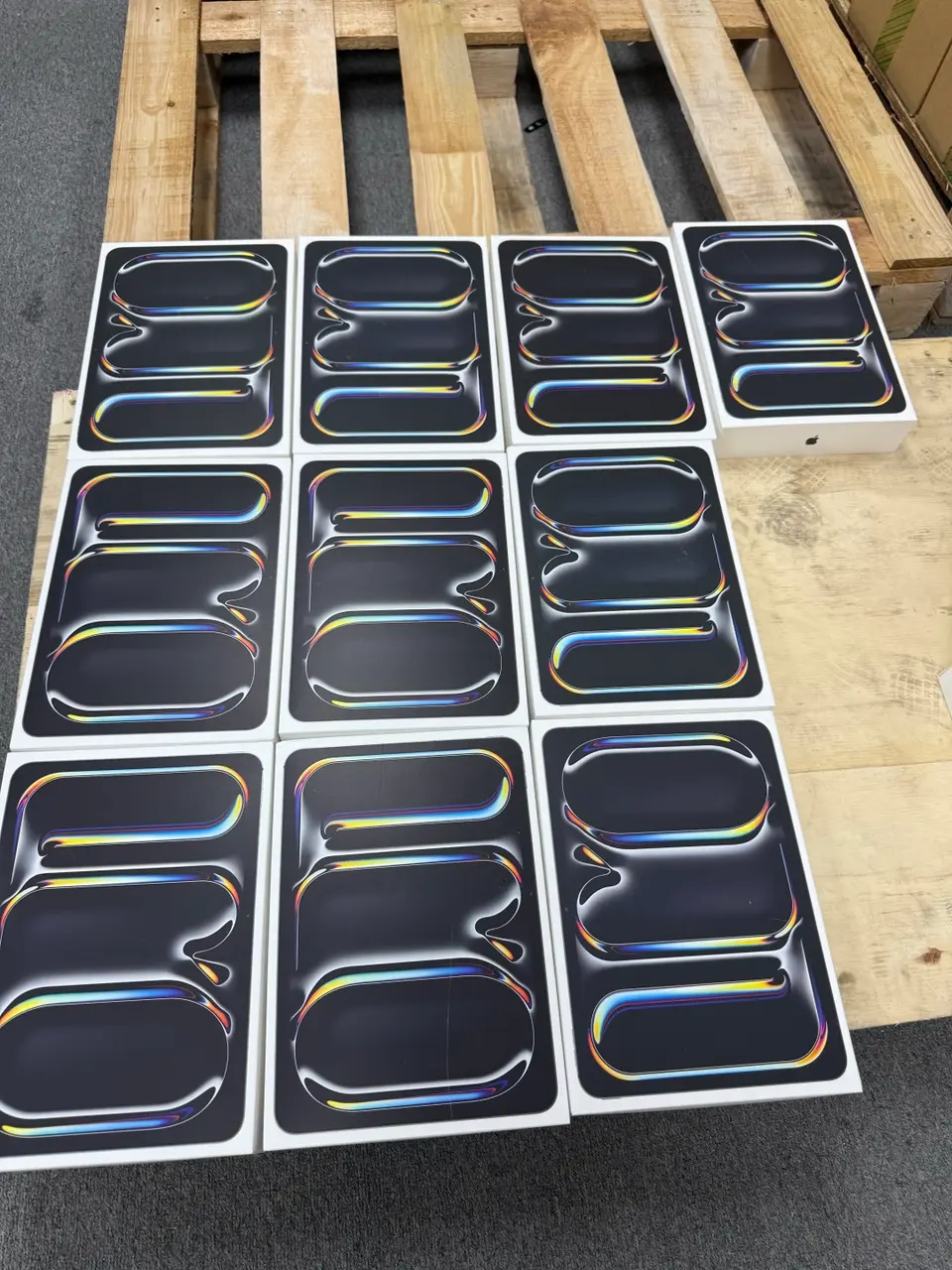 Recent boxed iPad Pro M4 inventory arranged on a warehouse pallet for batch review
